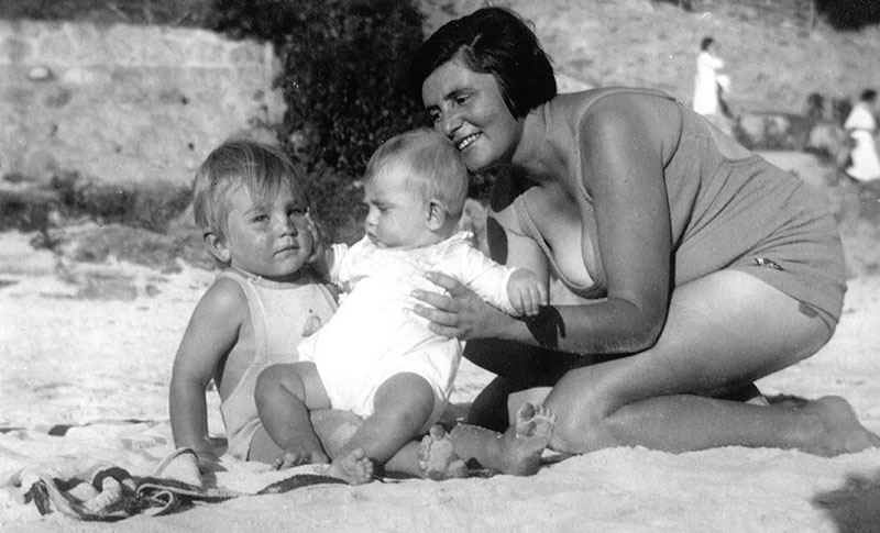 Albie with his mother and younger brother Johnny at Clifton beach on the Atlantic coast in Cape Town.