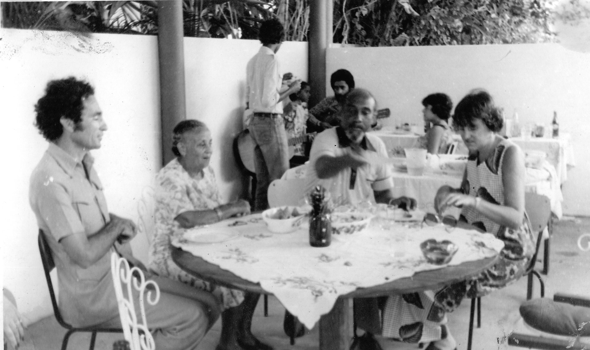 Albie having a meal with Marcelino dos Santos, Vice President of Mozambique, his mother, and second wife Pam Beira, from South Africa.