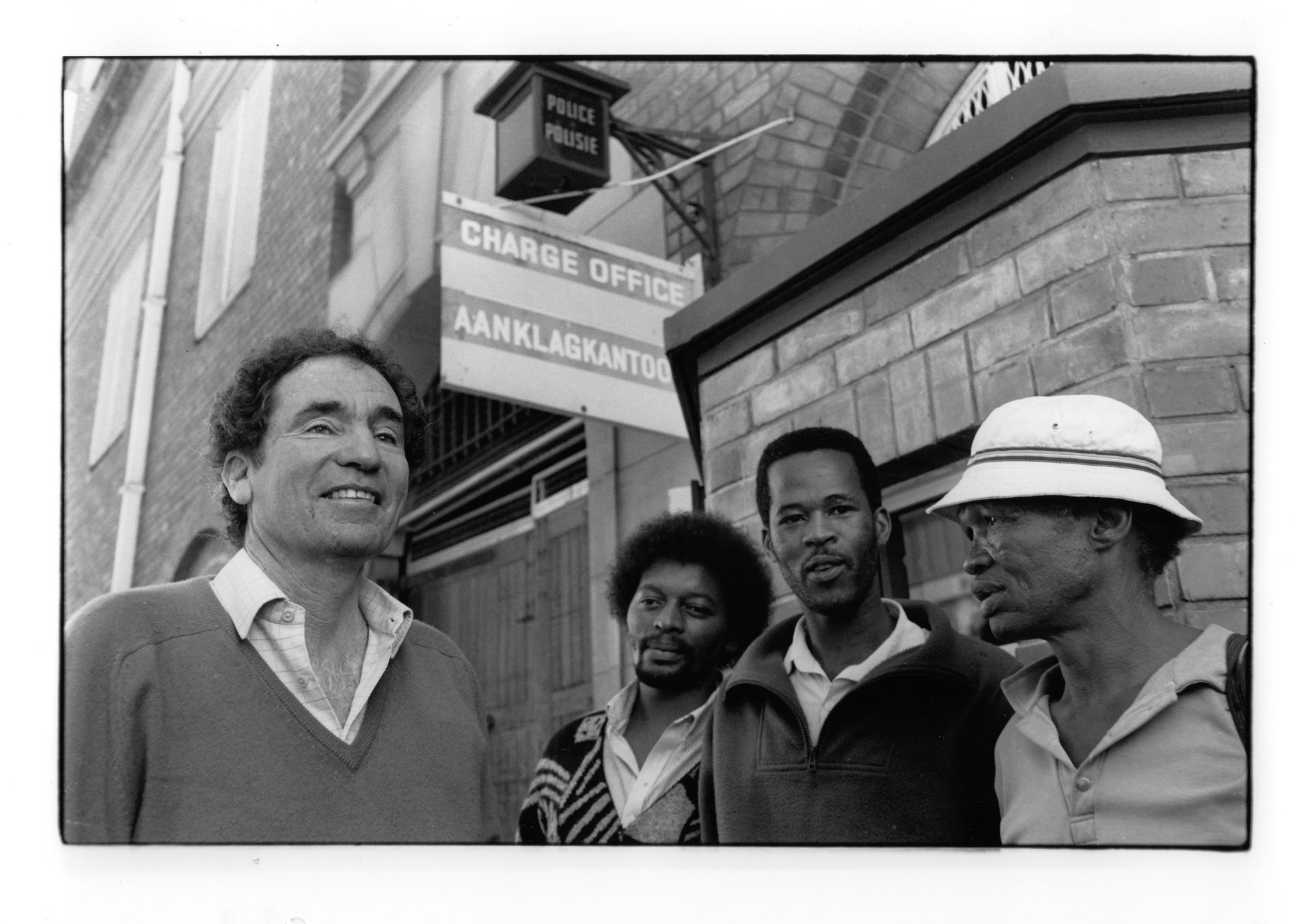 Albie upon return to South Africa, outside Caledon Square Police Station charge office where he had been detained twice and subjected to sleep deprivation.
