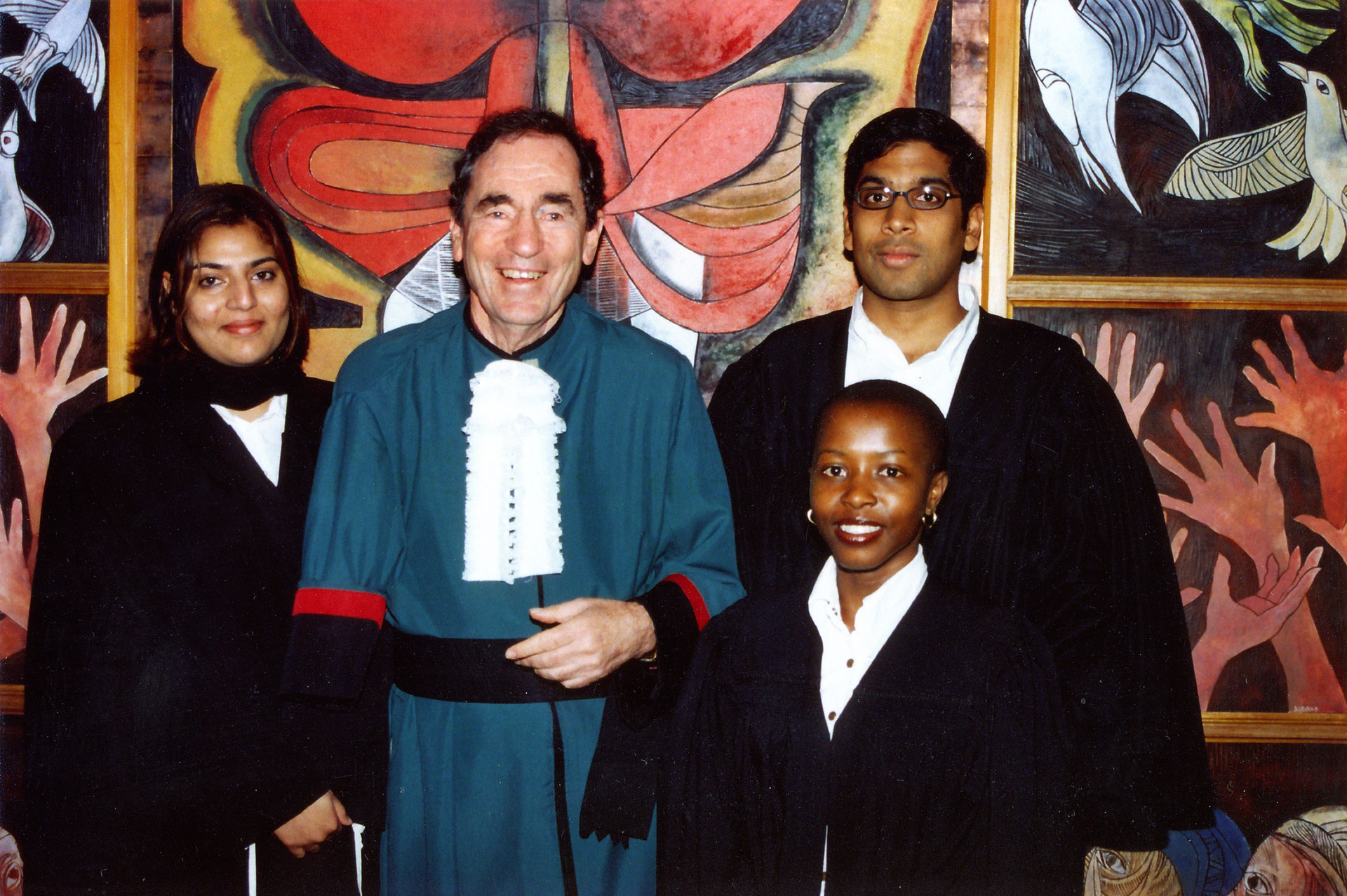 Albie and law clerks Deepak Gupta, Zanele Majola and Farzana Bardat, in front of Skotnes-Budaza artwork.