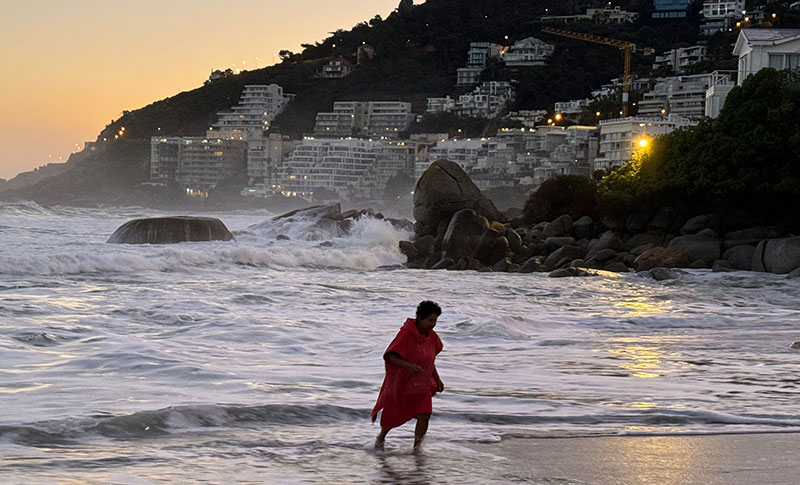 Vanessa walking at waters edge Clifton sunrise