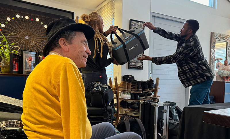 Albie with film equipment and crew Stephan van der Merwe and Odon Mwanza