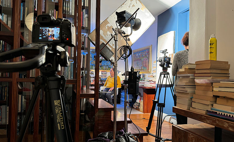 Albie in his office surrounded by film equipment